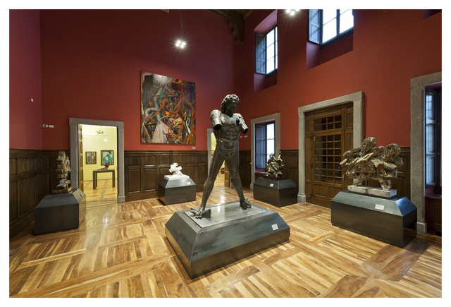 Il salone principale del Castello Gamba con le opere di Martini e Guttuso